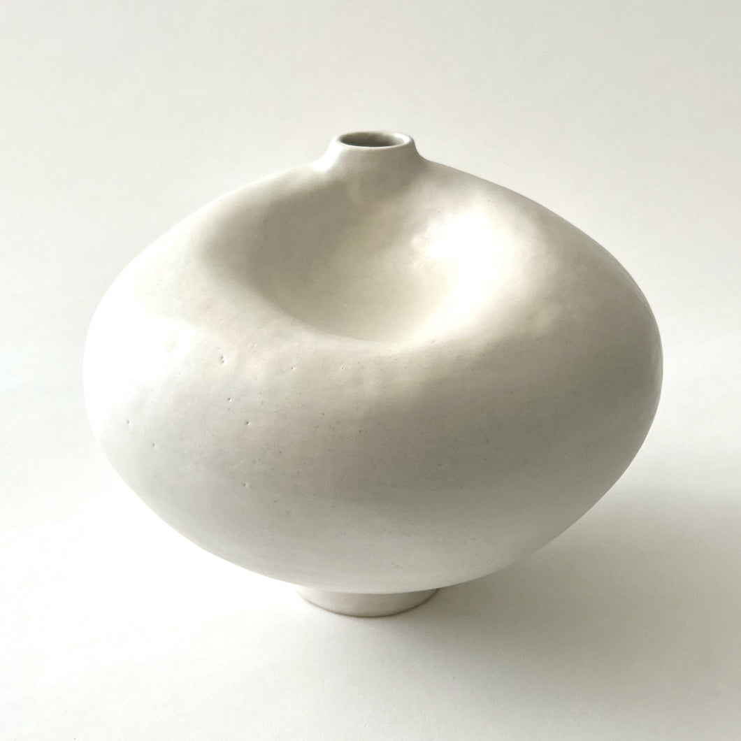 White dimple vase